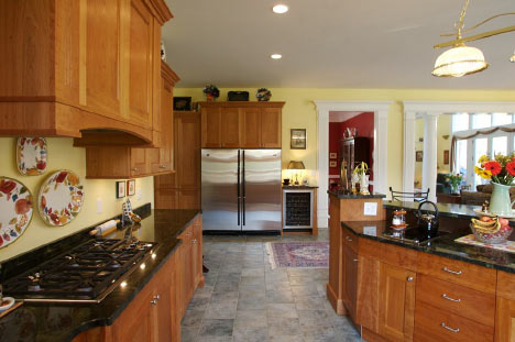 granite countertops mission style cherry cabinets